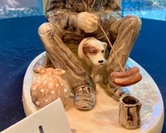 Lot 2150 $30.00 Replica of Norman Rockwell Hobo and dog, 1924 studio pottery by Ruth H