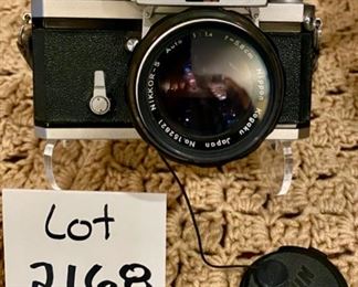 Lot #2168. $100.00. Vintage Nikon F 35mm Film Camera with Nikkor-S Auto Lens.