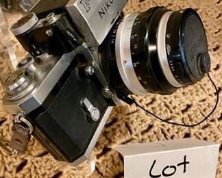 Lot #2168. $100.00. Vintage Nikon F 35mm Film Camera with Nikkor-S Auto Lens.