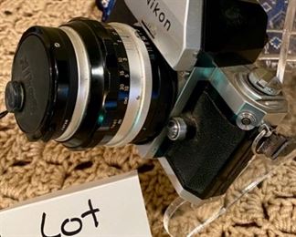 Lot #2168. $100.00. Vintage Nikon F 35mm Film Camera with Nikkor-S Auto Lens.