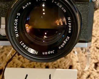 Lot #2168. $100.00. Vintage Nikon F 35mm Film Camera with Nikkor-S Auto Lens.