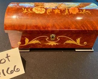 Lot 2166 $95.00 Reuge Music Box made in Italy with Nadia Theme 10" L x 5.5" W x 4.5" H Gorgeous inlaid wood - jewelry box interior, swiss movement. Not your typical music box.