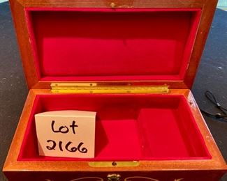 Lot 2166 $95.00 Reuge Music Box made in Italy with Nadia Theme 10" L x 5.5" W x 4.5" H Gorgeous inlaid wood - jewelry box interior, swiss movement. Not your typical music box.