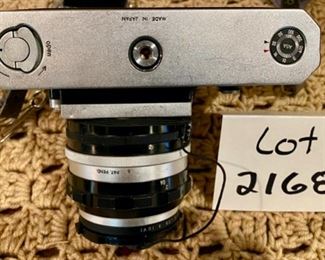 Lot #2168. $100.00. Vintage Nikon F 35mm Film Camera with Nikkor-S Auto Lens.