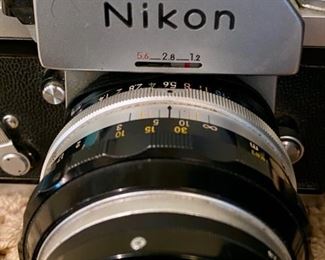 Lot #2168. $100.00. Vintage Nikon F 35mm Film Camera with Nikkor-S Auto Lens.
