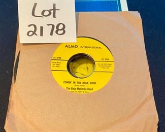 Lot 2178, $20.00 Lot of 23 "45 rpm" records mostly from the 1950's but does include "Me & Bobby McGee" by Janis Joplin. Also, 3 Sesame Street records.