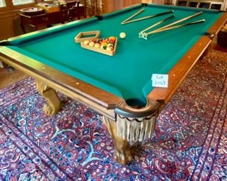 Lot 2169 Sunday Discounted Price: $700 FIRM. Was $975.00 Peter Vitale 8' professional pool table & accessories. Includes Pool cues, Set of Billiard Balls, Bridge, 15 and 8 Ball Racks, Chalk and Pool Cue Rack. Felt has been replaced within the last 2 years. Ask us about Delivery Services from one of our vendors. Typically $450.00 to break down and assembly at your home. Includes balancing of the pool table. (Rug is lot 2245).