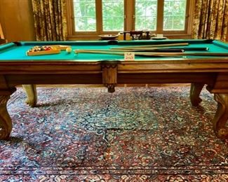 Lot 2169 Sunday Discounted Price: $700 FIRM. Was $975.00 Peter Vitale 8' professional pool table & accessories. Includes Pool cues, Set of Billiard Balls, Bridge, 15 and 8 Ball Racks, Chalk and Pool Cue Rack. Felt has been replaced within the last 2 years. Ask us about Delivery Services from one of our vendors. Typically $450.00 to break down and assembly at your home. Includes balancing of the pool table. (Rug is lot 2245).