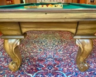 Lot 2169 Sunday Discounted Price: $700 FIRM. Was $975.00 Peter Vitale 8' professional pool table & accessories. Includes Pool cues, Set of Billiard Balls, Bridge, 15 and 8 Ball Racks, Chalk and Pool Cue Rack. Felt has been replaced within the last 2 years. Ask us about Delivery Services from one of our vendors. Typically $450.00 to break down and assembly at your home. Includes balancing of the pool table. (Rug is lot 2245).