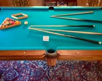 Lot 2169 Sunday Discounted Price: $700 FIRM. Was $975.00 Peter Vitale 8' professional pool table & accessories. Includes Pool cues, Set of Billiard Balls, Bridge, 15 and 8 Ball Racks, Chalk and Pool Cue Rack. Felt has been replaced within the last 2 years. Ask us about Delivery Services from one of our vendors. Typically $450.00 to break down and assembly at your home. Includes balancing of the pool table. (Rug is lot 2245).