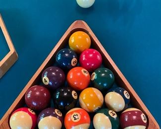 Lot 2169 Sunday Discounted Price: $700 FIRM. Was $975.00 Peter Vitale 8' professional pool table & accessories. Includes Pool cues, Set of Billiard Balls, Bridge, 15 and 8 Ball Racks, Chalk and Pool Cue Rack. Felt has been replaced within the last 2 years. Ask us about Delivery Services from one of our vendors. Typically $450.00 to break down and assembly at your home. Includes balancing of the pool table. (Rug is lot 2245).