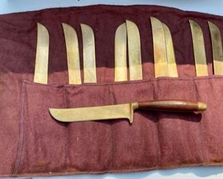 Lot 2175. $195.00. Vintage Brass with Rosewood Handled Flatware. 12 place settings; each setting has 11 pieces which include a steak knife, there are 12 additional serving pieces for a total of 144pcs. There is a storage box that is in rough shape but contains a storage area & covered drawer. Possible old Thailand/Siam flatware, not marked.