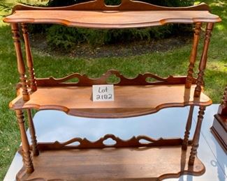 Lot 2182, $48.00. Antique, 3 tier wood shelf. Can rest on the floor or hang on the wall. Measures 33"W x 10" D x 27.5"H. Workmanship is top-notch!