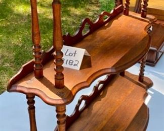 Lot 2182, $48.00. Antique, 3 tier wood shelf. Can rest on the floor or hang on the wall. Measures 33"W x 10" D x 27.5"H. Workmanship is top-notch!