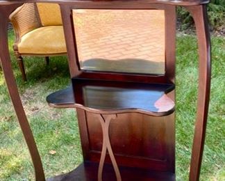Lot 2184, $145.00. Antique open shelf curio with beveled mirrors. 26.5" W x 10" D x 54" H. This has a Beauty and the Beast furniture comes alive quality to it! LOVE IT!
