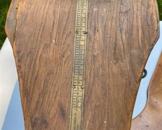 Lot 2185, $65.00. Antique "The Chicago Wire Chair Co", shoe sizer stool and a Joseph T Pearson & Son's sock sizer.