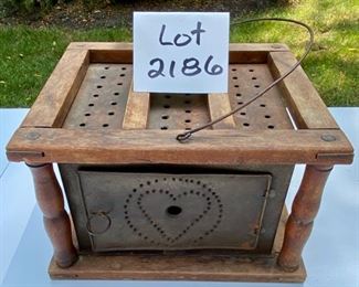 Lot 2186, $60.00. Antique Wood & punched metal foot/bed warmer