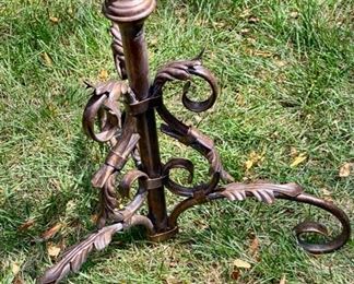 Lot 2200 $65.00. Antiqued, bronze color stand with 5 candle holders, 16 plastic crystals. 51" H x 15" Diameter. This would be charming holding some plants as well.