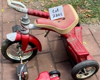 Lot 2201 $30.00. Toy Roadmaster Tricycle plus a Westpoint Tricycle with block pedals. Attention Grandparents! Keep these at your house!