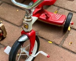Lot 2201 $30.00. Toy Roadmaster Tricycle plus a Westpoint Tricycle with block pedals. Attention Grandparents! Keep these at your house!