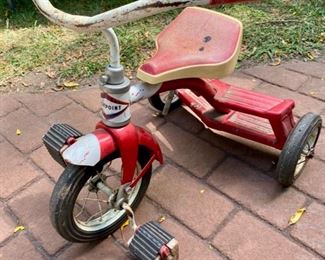 Lot 2201 $30.00. Toy Roadmaster Tricycle plus a Westpoint Tricycle with block pedals. Attention Grandparents! Keep these at your house!