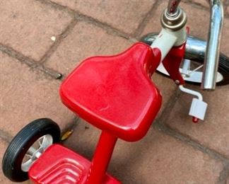 Lot 2201 $30.00. Toy Roadmaster Tricycle plus a Westpoint Tricycle with block pedals. Attention Grandparents! Keep these at your house!