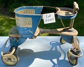 Lot 2202 $30.00 Vintage Blue baby walker (stroller) with cane accents. This was our homeowner's when she was a tot. Make this your next rehab project - so cute!
