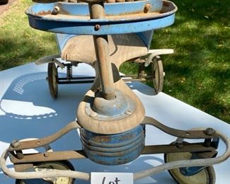 Lot 2202 $30.00 Vintage Blue baby walker (stroller) with cane accents. This was our homeowner's when she was a tot. Make this your next rehab project - so cute!