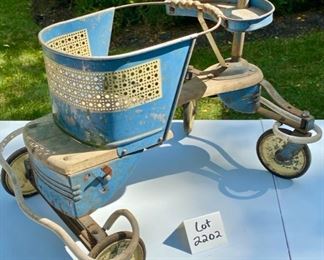 Lot 2202 $30.00 Vintage Blue baby walker (stroller) with cane accents. This was our homeowner's when she was a tot. Make this your next rehab project - so cute!