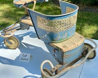 Lot 2202 $30.00 Vintage Blue baby walker (stroller) with cane accents. This was our homeowner's when she was a tot. Make this your next rehab project - so cute!