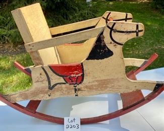 Lot 2203, $35.00 Vintage Kids Rocker 33.5" L x 22.5" H x 12.5" W. This side could use some TLC!