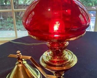 Lot 2176, $350.00. Antique or Vintage Electric light unit swings 360 degrees. Heavy brass cone-shaped base stays stationary and balances the fixture. Owner paid $675, we are asking, $350. This is one cool lamp.