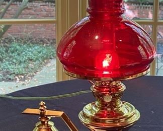 Lot 2176, $350.00. Antique or Vintage Electric light unit swings 360 degrees. Heavy brass cone shaped base stays stationary and balances the fixture. Owner paid $675, we are asking, $350. This is one cool lamp.