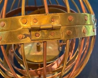 Lot 2173. $275.00. Rare. An Antique Gimbal Whaler Lamp of brass and copper. Appears to be handmade, early 19th Century. Has a "32" stamped on the hinges. The lamp has a gimbal in it which allows the lantern wick to never turn over. Blacksmiths used to make the iron black gimbal whaler lamps, while the ships' men would make the copper and/or brass ones. This appears to be crafted and never used. Look at the type font of the #32 - very old.