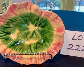Lot 2225, $65.00. Antique Etruscan Majolica leaf plate, signed. (small chips on the underside of leaf edge, does not show on display. 9" x 7" Stand is not part of lot.