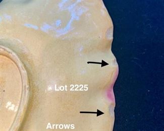 Lot 2225, $65.00. Antique Etruscan Majolica leaf plate, signed. (small chips on the underside of leaf edge, does not show on display. 9" x 7" Stand is not part of lot. Also one more chip above one of the arrows.
