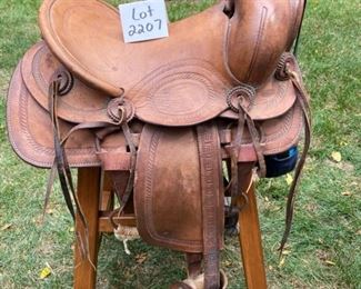 Lot 2207. Asking $150.00. Child's Western-style Shetland Pony saddle, mounted on a custom made stool to serve as a saddle chair! 34"T x 20"W x 16" D Lot 2207.