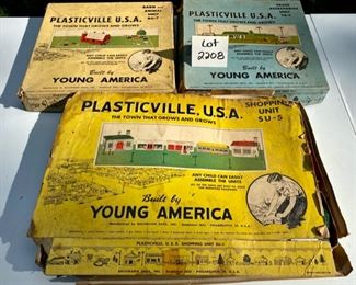 Lot 2208 $75.00 3 sets of Vintage Plasticville, USA, built by Young America. Build a plastic village -- we have for sale: Barn Animal Unit BA-7, Train Accessories TA-1. , Shopping Unit SU-5. Boxes aren't in great shape, but the structures are in terrific condition