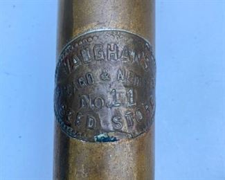 Lot 2214. $40.00. Vintage Brass Hand Pump #11 used for Planting Seeds from Vaughan's Seed Store in Western Springs, and there is a whole lot of history behind this seeder. I'm sorry we don't have a better photo of this awesome piece. 24" L x 1.5" W. i.d. tag says Vaughan's Seed Store, Chicago & New York. I believe this piece is brass.