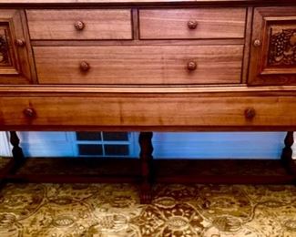 Lot 2265. $995.00. Unique Antique Buffet /Server and an open style mirror and shelving piece atop the buffet, with turned wood and interesting adornment. The two pieces coordinate, but are not an exact match, however, this was how the owners used these pieces. Selling as one lot. 4 drawers (2 w/liners for silverware) and 2 cubbies with beautiful carved front doors. "Buffet & Upper: Overall Height: 81""tall
Buffet: 66""w x 22""d x 37.25""
Upper: 43.5""h x 62""wx10.5""d. Mirror is 28.5 dia". Idea: The bottom half of this credenza could be used to hold a flat screen television, or of course as a buffet in a dining room, a foyer piece for storing gloves and hats or dog items, a bedroom as additional storage. Don't let the top piece (which is gorgeous) throw you off as to where you might use this! It's very functional in addition to beautiful.