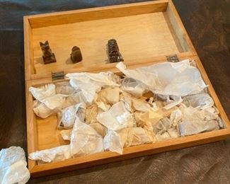 Lot 2229. $22.00. Onyx chess set. A few pieces have chips but could be fixed with strong glue. Wooden board needs a little love, some of this looks like it's been well-loved! Pieces are stored inside.