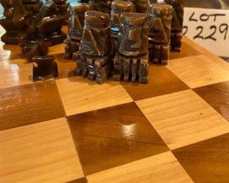 Lot 2229. $22.00. Onyx chess set. A few pieces have chips but could be fixed with strong glue. Wooden board needs a little love, some of this looks like it's been well-loved!