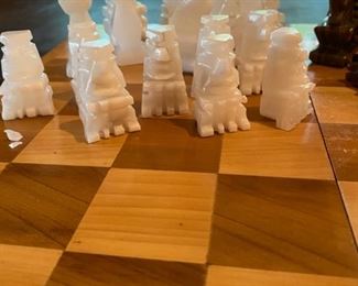 Lot 2229. $22.00. Onyx chess set. A few pieces have chips but could be fixed with strong glue. Wooden board needs a little love, some of this looks like it's been well-loved!
