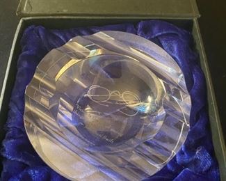 Lot 2269, $28.00. Levenger crystal ashtray in presentation gift box. 6" diameter. Says, "Vision is the art of seeing things invisible", by Jonathan Swift. Ashtray is etched with a pair of spectacles. cute.