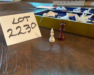 Lot 2230. $22.00. A sweet travel chess set with a full set of wooden pieces. Velvet lined board is painted, brownish and black, not in perfect condition but it plays great! How cute are these little guys?