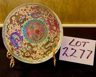 Lot 2277, $250.00, a steal. Fabulous Japanese Dragon Pattern Bowl and easel. Bone china almost translucent. 6.5" Museum quality. Lightweight, INCLUDES stand Continue looking at photos; this is just an amazing piece.