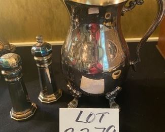 Lot 2279. $55.00. 1) Rogers Silver Co. Water Pitcher and Sheffield salt shaker and pepper grinder, signed "The Sheffield Silver Co.".