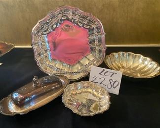 Lot 2280, $30.00. 1) Silverplate butter dish, 2) International Silver 11" Diam footed Bowl,3) Reed &n Barton Holiday bowl 9" Diam, 4) Small Silver Bowl 6.5" Diam. The large Holiday Bowl is not pink, so sorry - that is my tee shirt reflection taking the photo. Nice set.