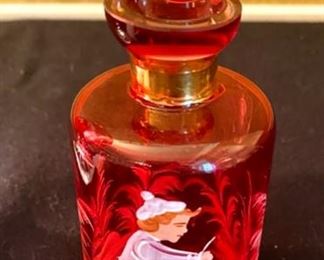 Lot 2288. $85.00 1) Cut to clear cranberry pedestal dish etched, 9" x 6" . 2) Cranberry Perfume Bottle with stopper hand painted, featuring a boy on a bicycle. 7" x 3.5". (Paid $110.00 for just the Perfume Bottle)
