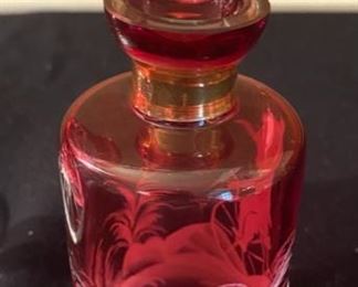 Lot 2288. $85.00 1) Cut to clear cranberry pedestal dish etched, 9" x 6" . 2) Cranberry Perfume Bottle with stopper hand painted, featuring a boy on a bicycle. 7" x 3.5". (Paid $110.00 for just the Perfume Bottle)